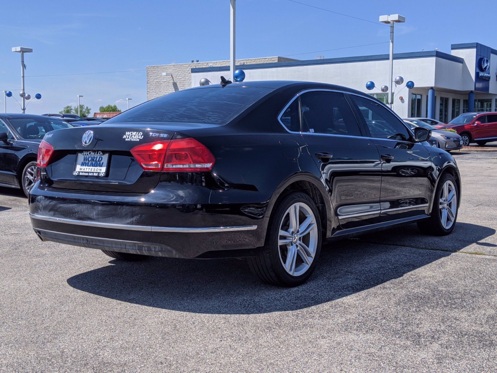 Pre-Owned 2014 Volkswagen Passat TDI SE w/Sunroof FWD Sedan